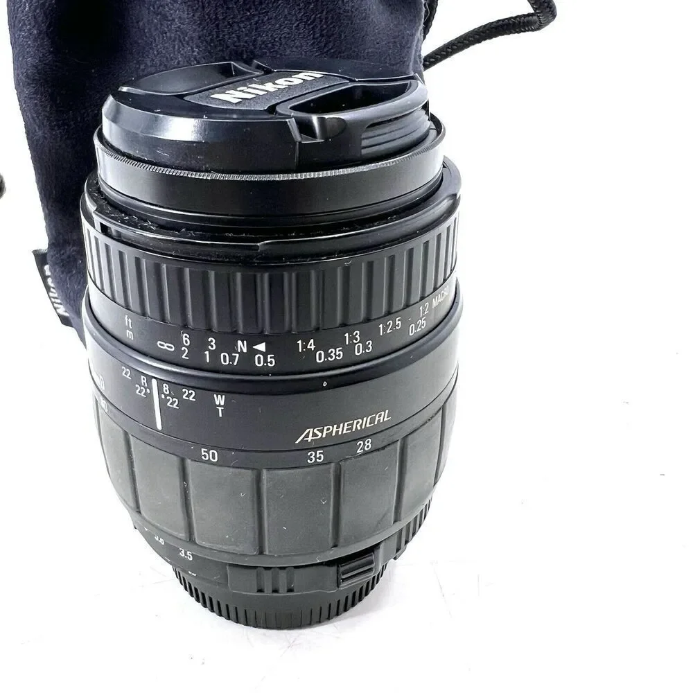 Sigma 28-80f/3.5-5.6 Aspherical Macro Lens w/a Tiffen Sky 1A Filter & Carry Bag